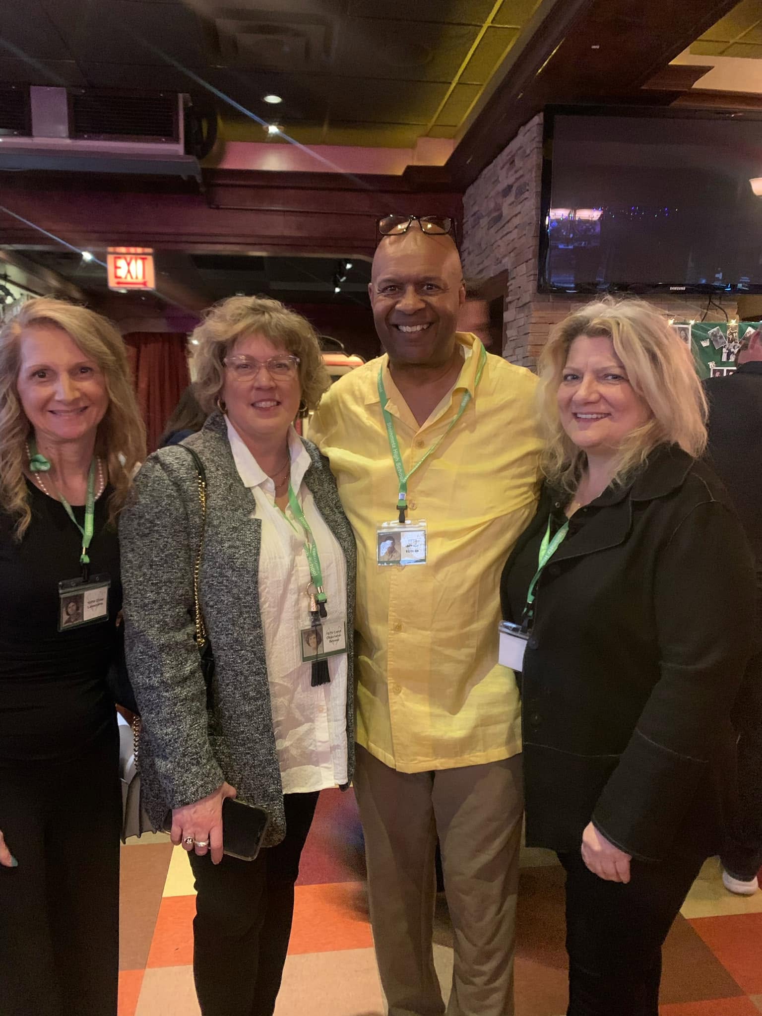 Friends celebrating together after 40 years at a reunion