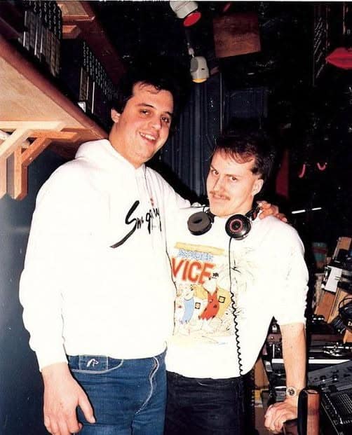 DJ Retro Russ Fritz with Tim Spinnin Schomer in a nightclub DJ booth