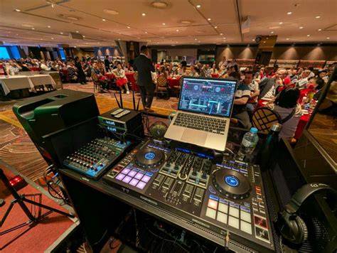 DJ Retro Russ Fritz providing audio support at a corporate meeting