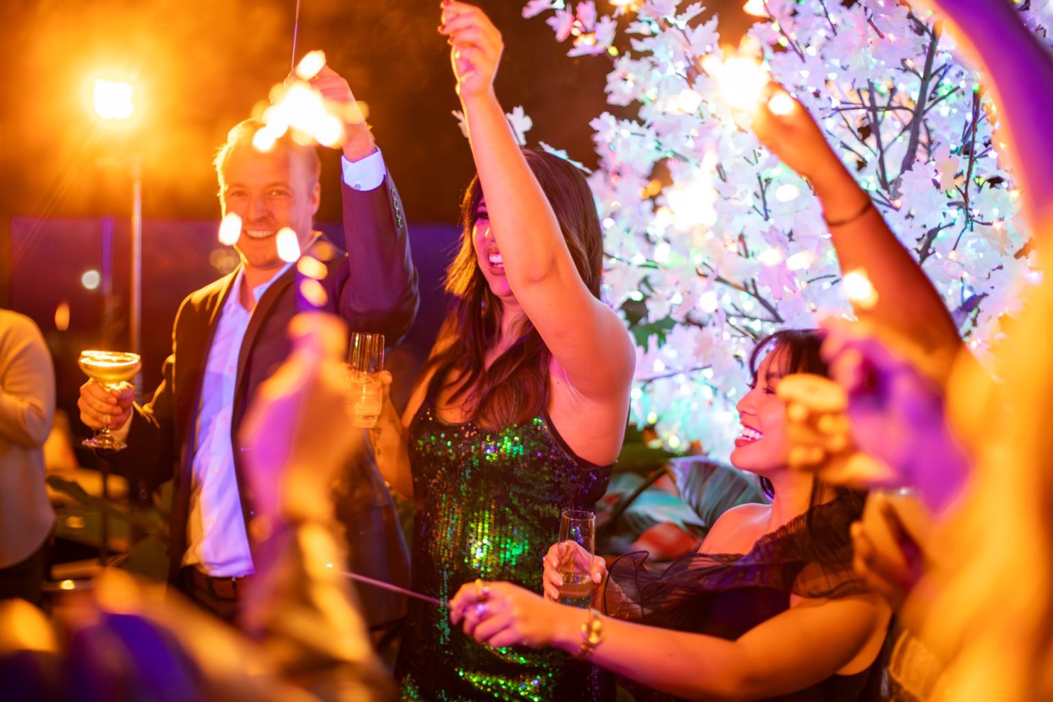 Guests dancing at an upscale New Year's Eve celebration