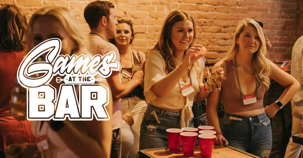 Guests participating in games during a social event at a bar